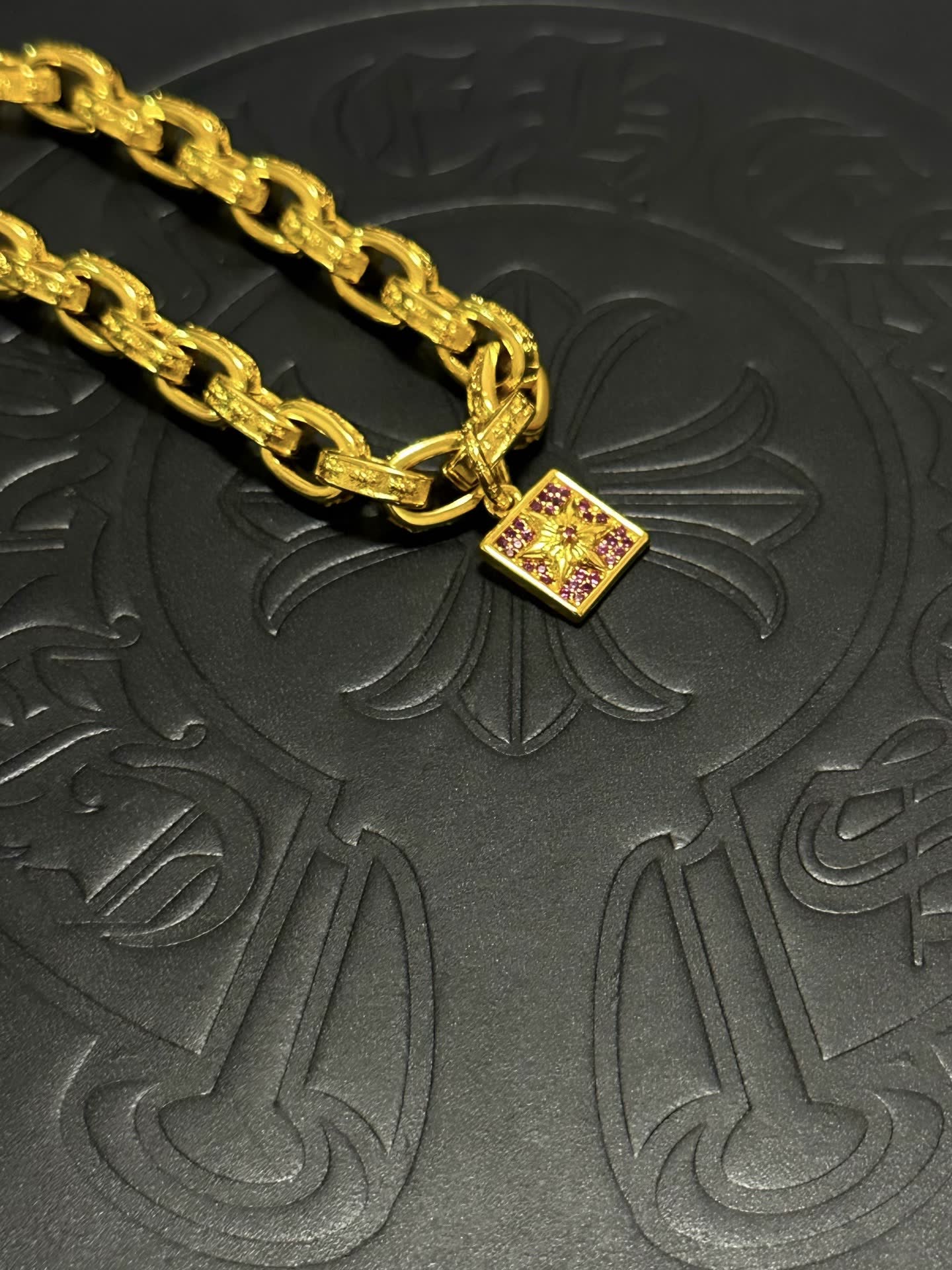 Chrome Hearts Gold Tone Bracelet with Pink Crystal Charm